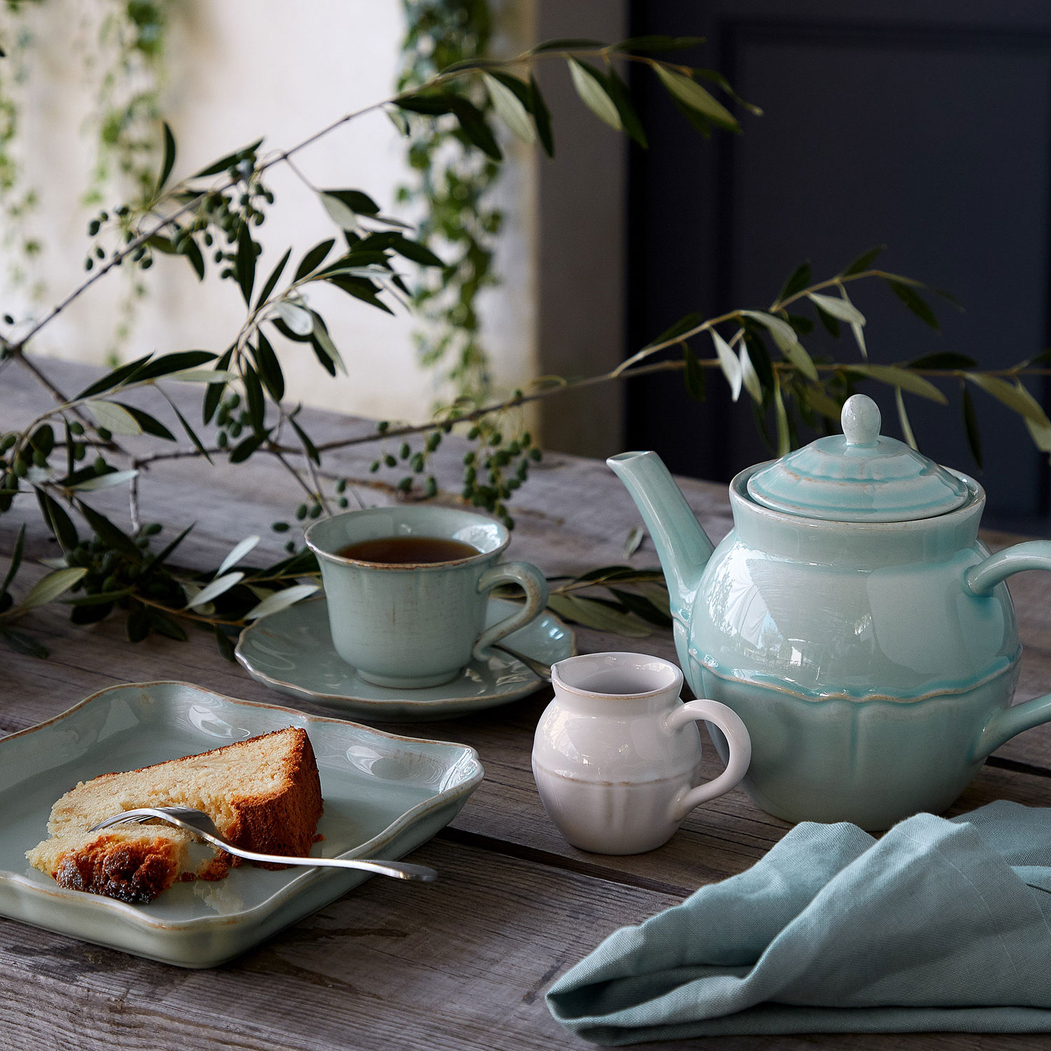 Alentejo tea cup and saucer 220ml, turquoise stoneware with hand-painted wavy rims - Costa Nova - 5606739930585